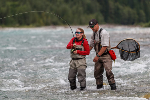 Fighting a large bull trout on the fly