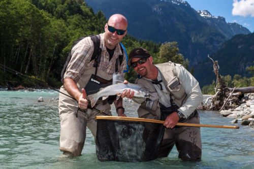 Catching fish on a past heli fishing trip in B.C.